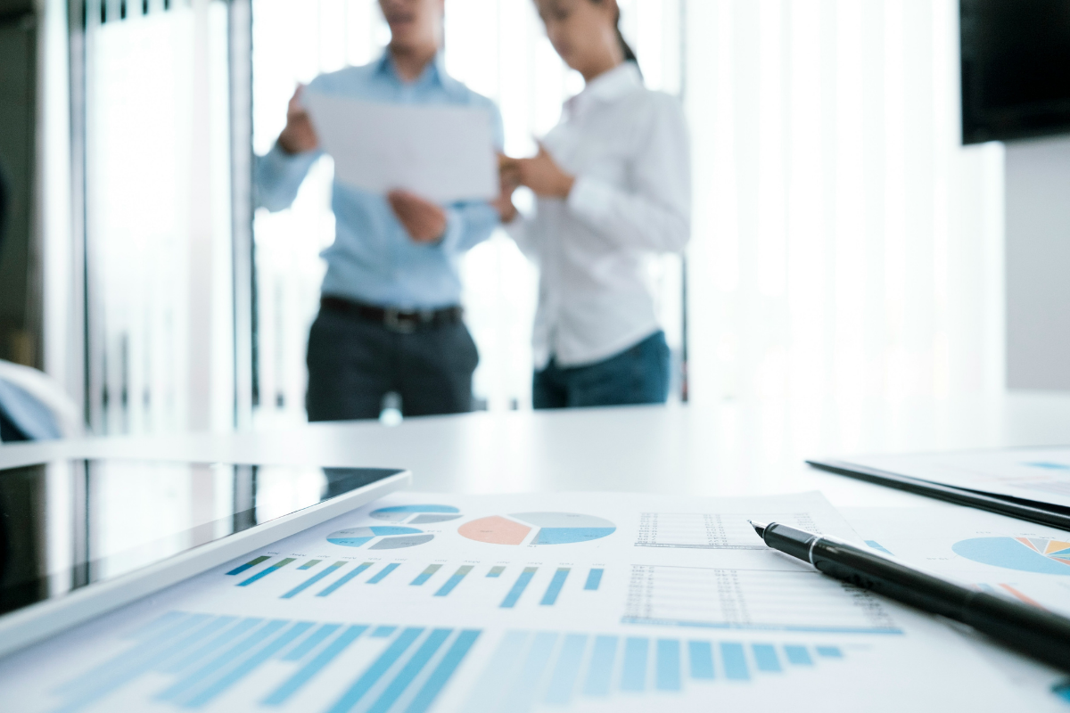 Business leader reviewing retirement workforce cost projections.