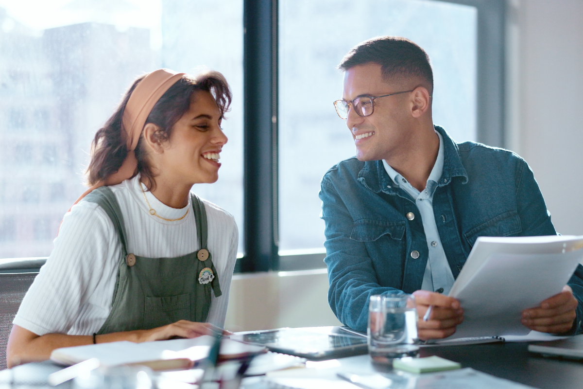Employee speaking with financial coach